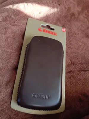 حامله هاتف، من الجلد الطبيعي .