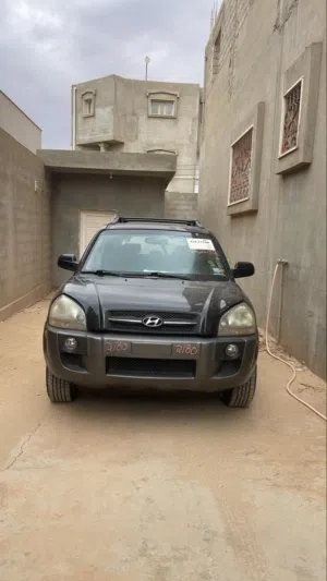 زجاج توسان 2007 خلفي