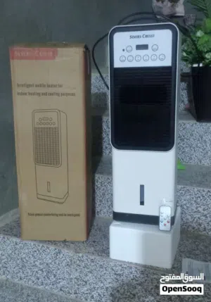 مبردة هواء حجم مكتبي مع ريمونت وكذلك تعمل باللمس  مع مطارتي ثلج  وتعطي هواء حار بالشتاء ماركه الماني