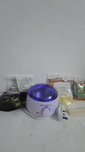 جهاز تسخين الشمع جديد مع 7 اكياس شمع