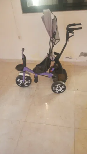 بسكليت اطفال مع تحكم يدوي وشمسيه للبيع