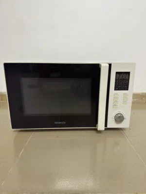 Kenwood MWL210 microwave oven, featuring a 900W microwave power output and a 1000W grill power.