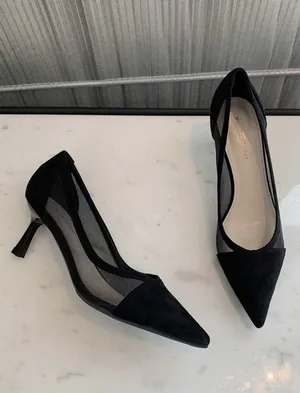 ‏مع كعب ‏.‏ أخرى ‏.‏ 39‏3