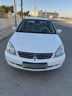 متسوبيشي 2012 محرك 1600 اصلي GLX لون لؤلؤي