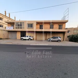 ‏ثلاث طوابق ‏.‏ 976 م٢ ‏.‏ الوسيط‏2