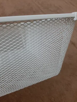 4 Pc iron net baskets and 2 dozen cloth hanging rods in excellent condition at throw away price.