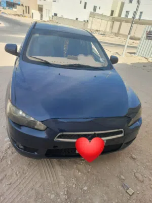 ميتسوبيشى لانسر Gl القرش موديل 2008