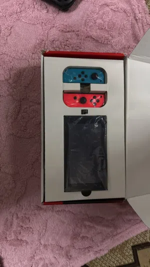 Nintendo Switch نسخة اوريجينال قابلة للتهكير بكج كامل مع كل ملحقاته و256 غيغا ذاكرة اضافية