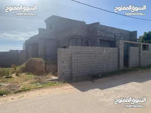 منزل قيد الإنشاء للبيع موقع وتصميم معماري ممتاز طريق المطار سوق الاحد -الأحياء البرية- مدينة طرابلس
