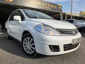 NISSAN versa S, model 2009, Petrol