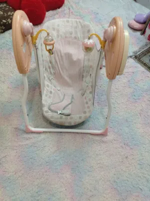 هزاز اطفال بعمل على البطاريات والكهرباء