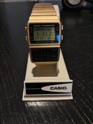 Casio Gold Calculator watch Iluminator NEW