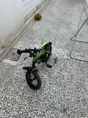 دراجه وسياره للبيع