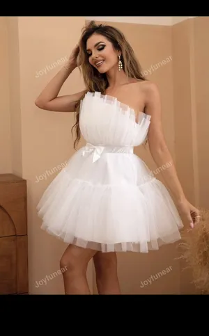 ‏فساتين قصيرة ‏.‏ L ‏.‏ زهري‏0