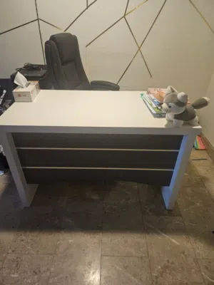 office desk and chair and side table