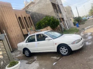 بروتون ويرا2004 السياره جاهزه من كلشي كير مكينه مكفولات السياره على ايدنه السياره اني ثاني راعي اله