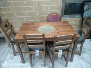 well maintained dining table with chair and extra cushion for 15kd