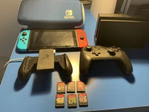 Nintendo Switch with official pro controller and 6 games listed in the description