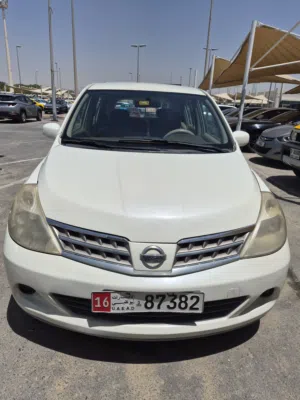 nissan tida 2009 GCC abu dhabi plate