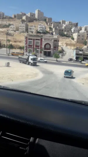 ارض تجاري للبيع قريبة من مطار عمان ماركا الجنوبية إسكان الفردوس صالة الأميرة سمية