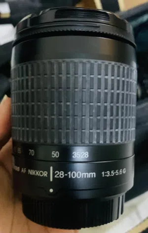 Nikon D300 (for vintage collectors) with lens 28-100mm