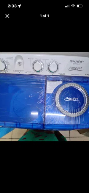 sharp washing machine good as new 7 kg with dryer. steel stole with wood , 5 layers metal rack.table