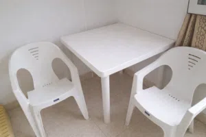 table with 2 chairs.