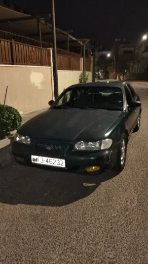 سيارة هيونداي سوناتا 1996 موديل، لون زيتي، حالة جيدة، أوتوماتيك للبيع