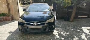 كامري هايبرد 2016 اسود بسعر حرق