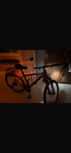Only 10 days used gear bicycle for sale with accesories