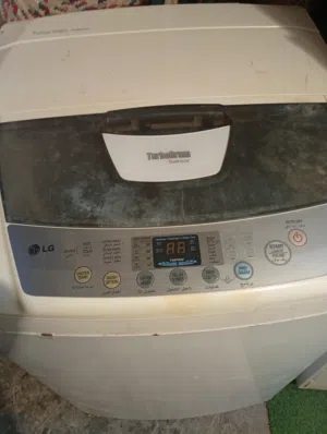 غسالة ملابس تشتغل امورها تمام 9/10