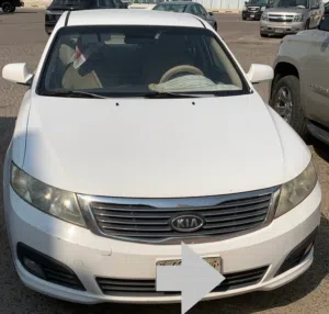 كيا اوبتيما 2009 LX صالون بحالة جيدة جدا بحاجة معاون أمامي وتعبية غاز مكيف