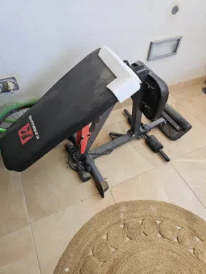 Bench with leg extension never used with free weights