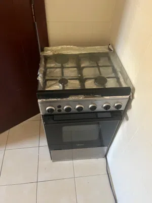 New, unused 4 burner stove