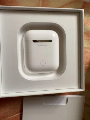 Original AirPods 2 for sale excellent condition with zero scratch marks and it’s wire charge