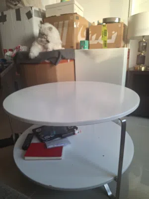 White living room table, 2 floors, metal sides.