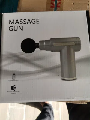 الصورة فيها علبة لجهاز *مسدس مساج Massage Gun*