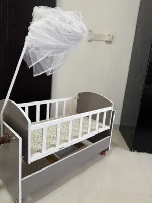 Wooden bay cot (cradle) with mosquito net