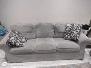 Ikea sofa well maintained with extra sofa  cover
