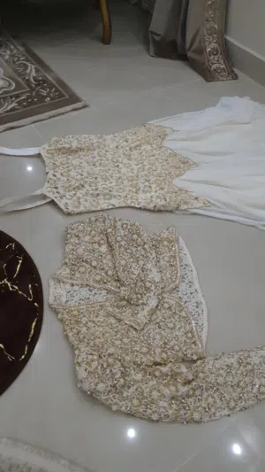 فستان مناسبه لبسه واحدة كالجديد ب2000 جنيه   وجاكت اسود مناسبه تلبيس لحد 70 كيلو ب400 جنيه