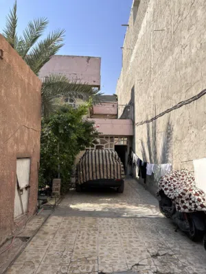 بيت في حي اور 600 فرع عطا العبيدي مساحة 250