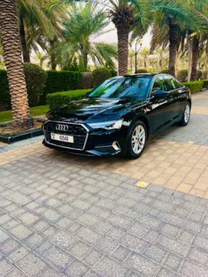 Audi A6 model 2024 black with screen سيارة اودي A6 موديل حديث بها شاشة ومثبت سرعة وتقنيات حديثة