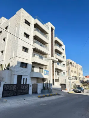 شقة أرضيه طريق المطار بعيده 2 كيلو عن شارع المطار مدخلين كراج خاص جديده لم تسكن حديقه 257 متر