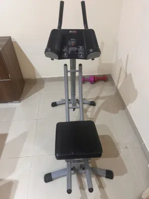 جهاز تمارين لعضلات البطن مع الأوزان من شركة Ab coaster