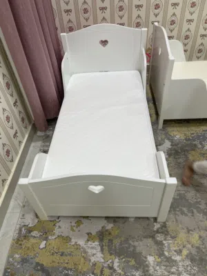 Two kids bed with mattress and two side  it’s new from home center