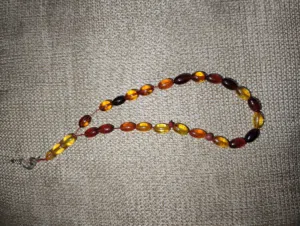 مسبحة كهرمان تعليقة فضة