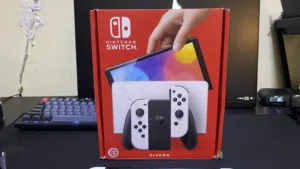 Nintendo Switch Oled 64GB + Mario Kart 8 Deluxe Used Once Extremely good condition almost no damage