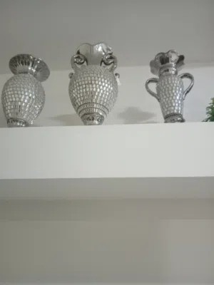 مزهريات وشمعدانات