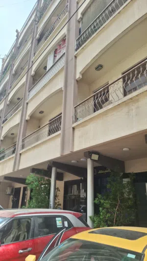 شقة للبيع ملك صرف الكرادة عمارة الشيد رقم 3