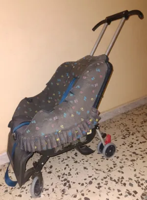 كرسي سيارة يتحول الى كروسة